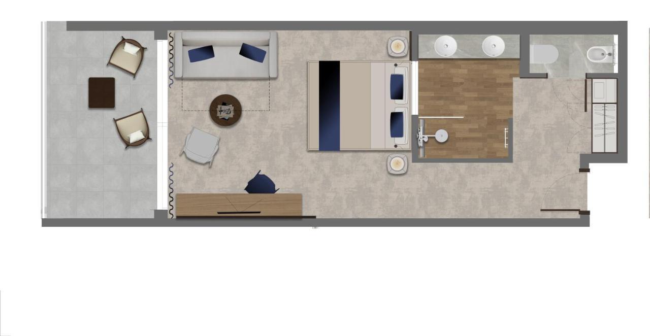 Deluxe Doppel- oder Zweibettzimmer mit Balkon und seitlichem Meerblick
