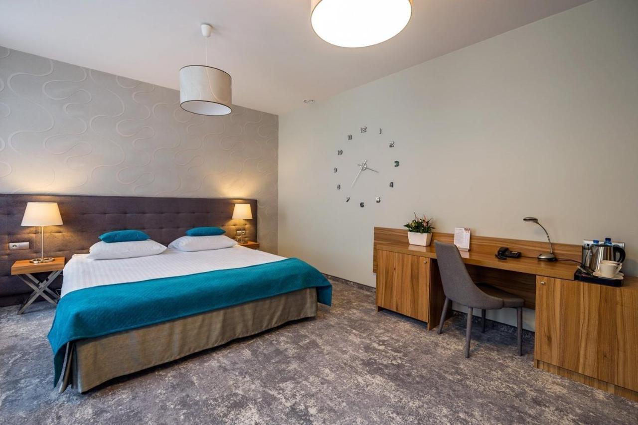 Suite Deluxe con 1 Letto King-Size e 1 Divano Letto