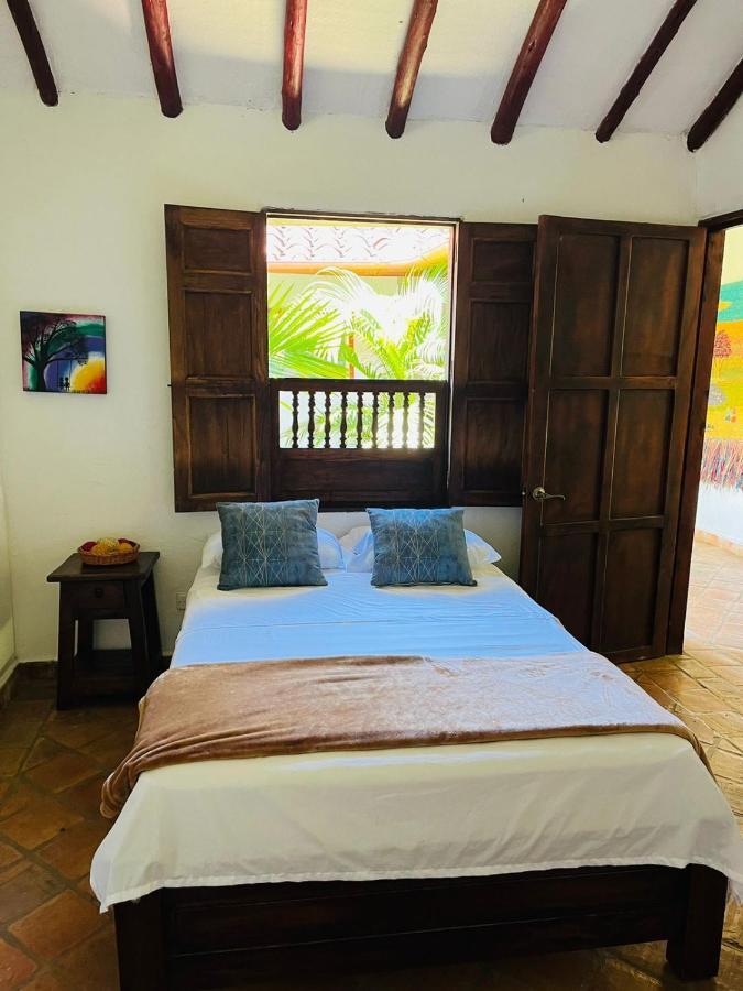 Cama individual en habitación compartida mixta