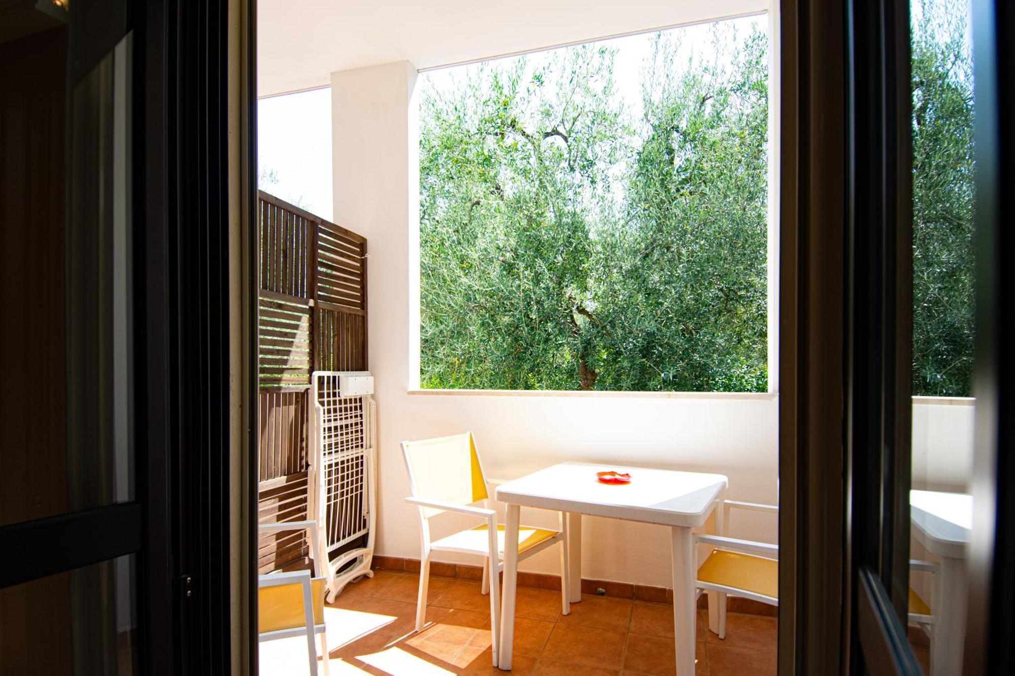 Junior Suite with Balcony and Garden View,893800243:JPEG