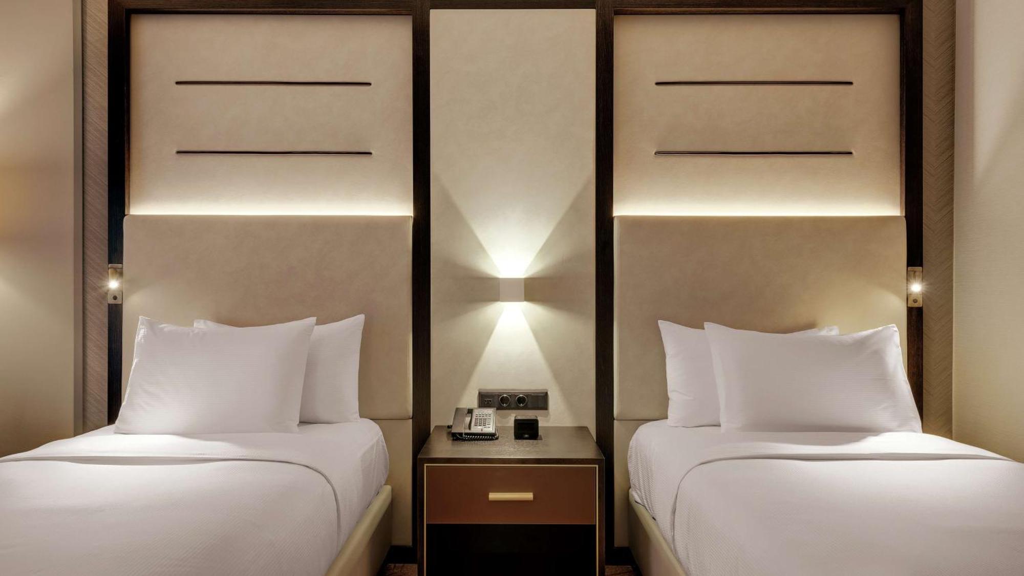 Quarto Twin com Vista para o Pátio