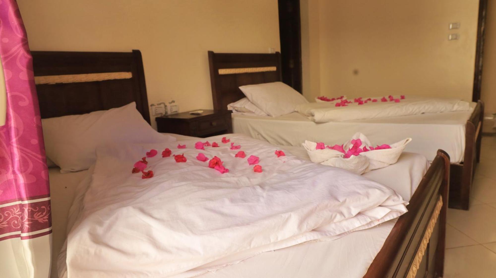 Deluxe Doppelzimmer (2 Erwachsene & 1 Kind)