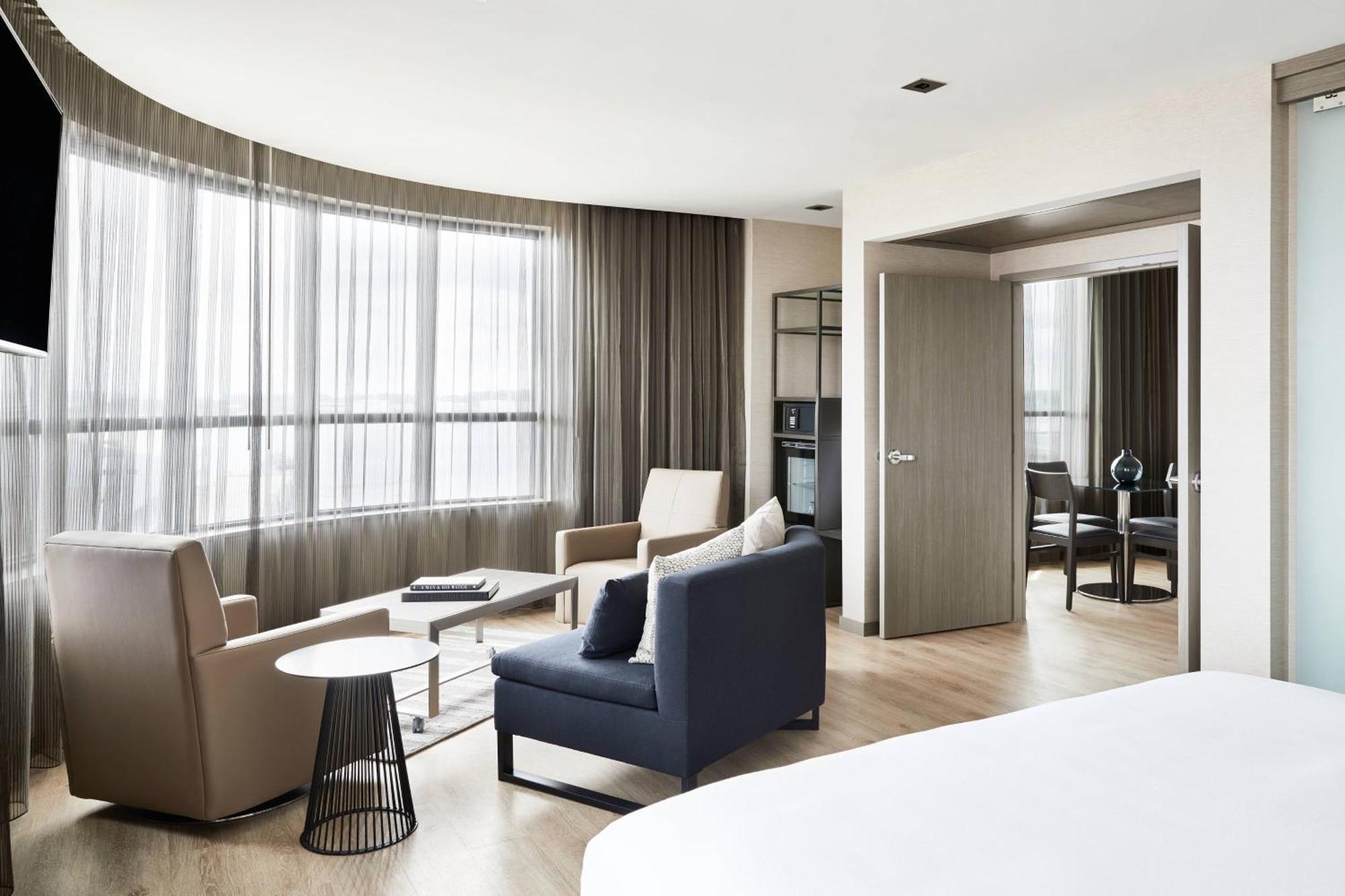 One-Bedroom King Suite with Sofa Bed and Water View - Mobility Accessible with Roll-In Shower
