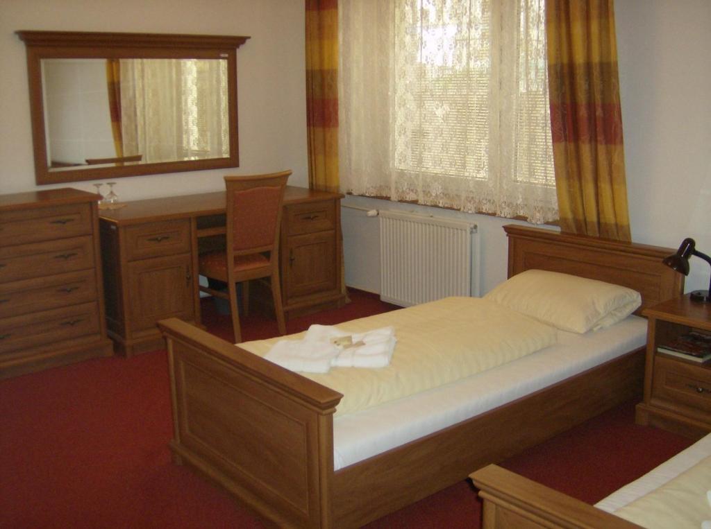 Doppel- oder Zweibettzimmer