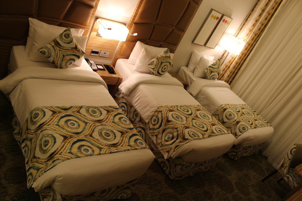Deluxe Kamer met 3 Eenpersoonsbedden