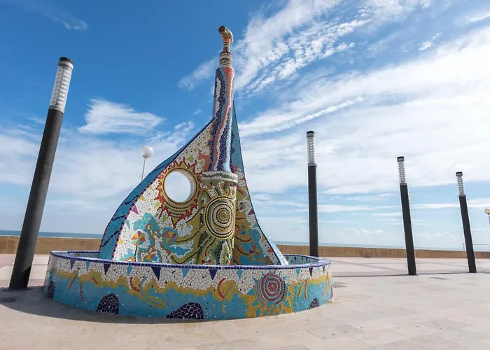 Acogedor apartamento en Daimús a 150 metros de la playa con parking privado y piscinas comunitarias