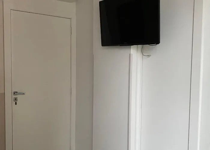 Suíte 1 com cama de casal,em apartamento compartilhado ar condicionado, tv, e Wi-fi -frigobar