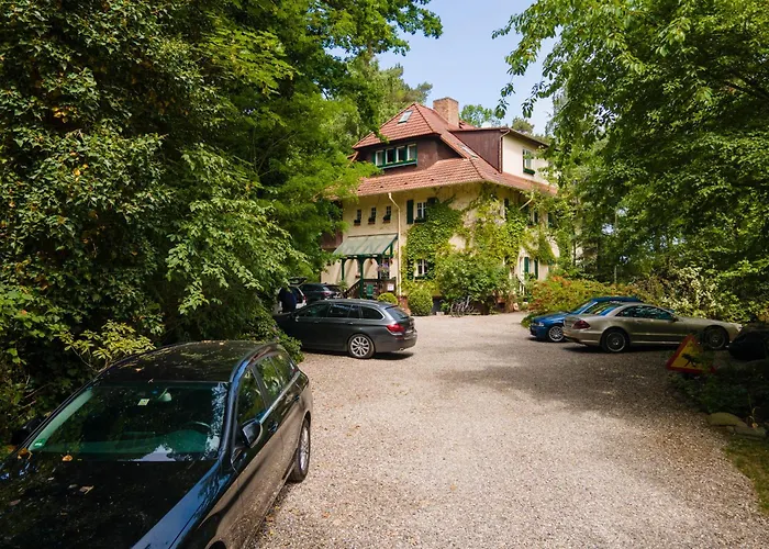 Strandvilla Hubertus Boltenhagen - Ferienwohnungen Apartment mit Parkplatz WLAN Küche Garten Grillplatz Waldbaden