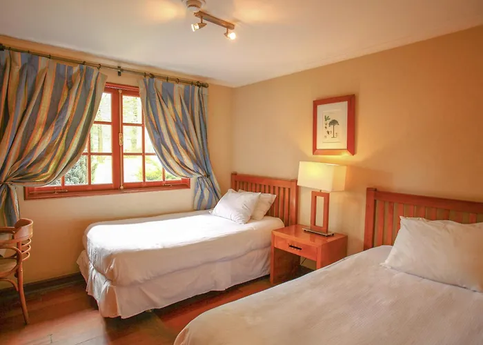 Hotel Y Cabanas Palomar - Caja Los Andes